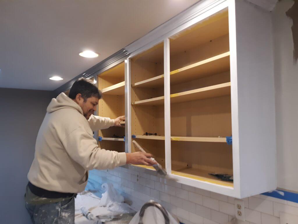 Painting Kitchen Cabinets Klappenberger & Son Employee using Sherwin Williams Emerald Urethane