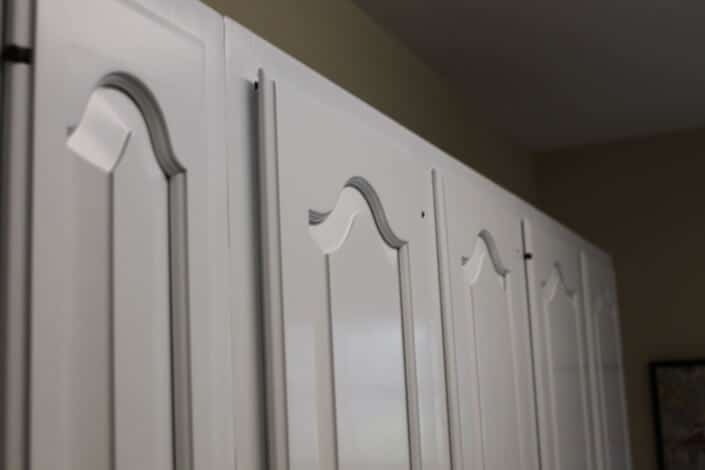 Baltimore Painting Company painting kitchen cabinets that look amazing