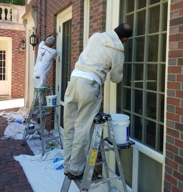 Man Prepping a home to paint in NW DC