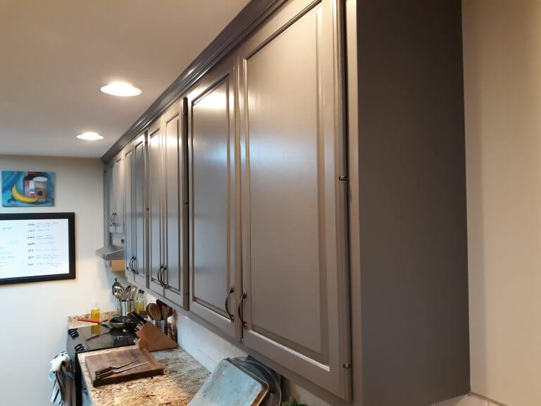 Painted kitchen cabinets from a stain to a dark taupe