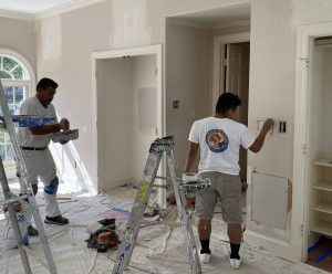 Spackle walls prior to painting