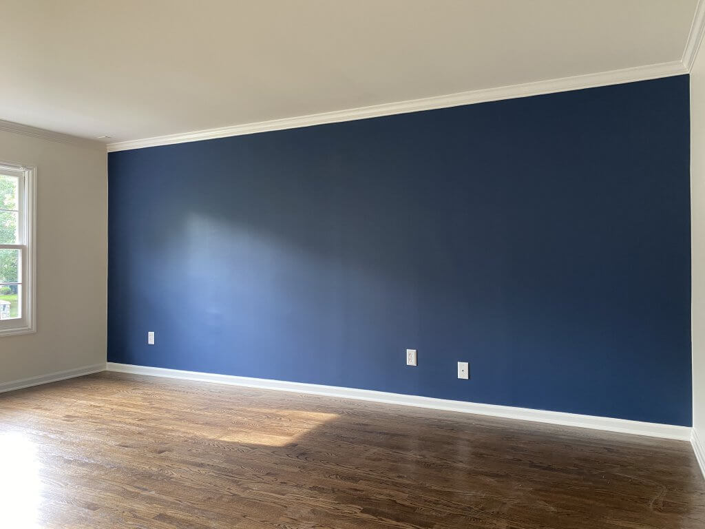 Interior painting in Silver Spring includes painting this bedroom.