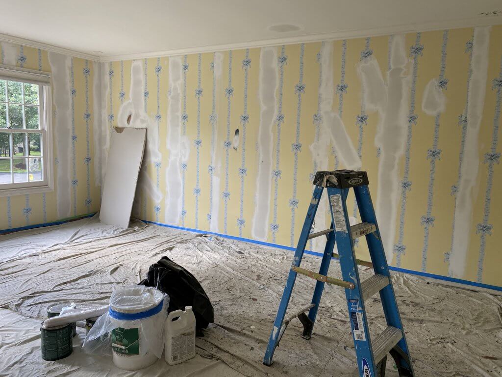 Klappenberger & Son spackling over wallpaper in silver spring