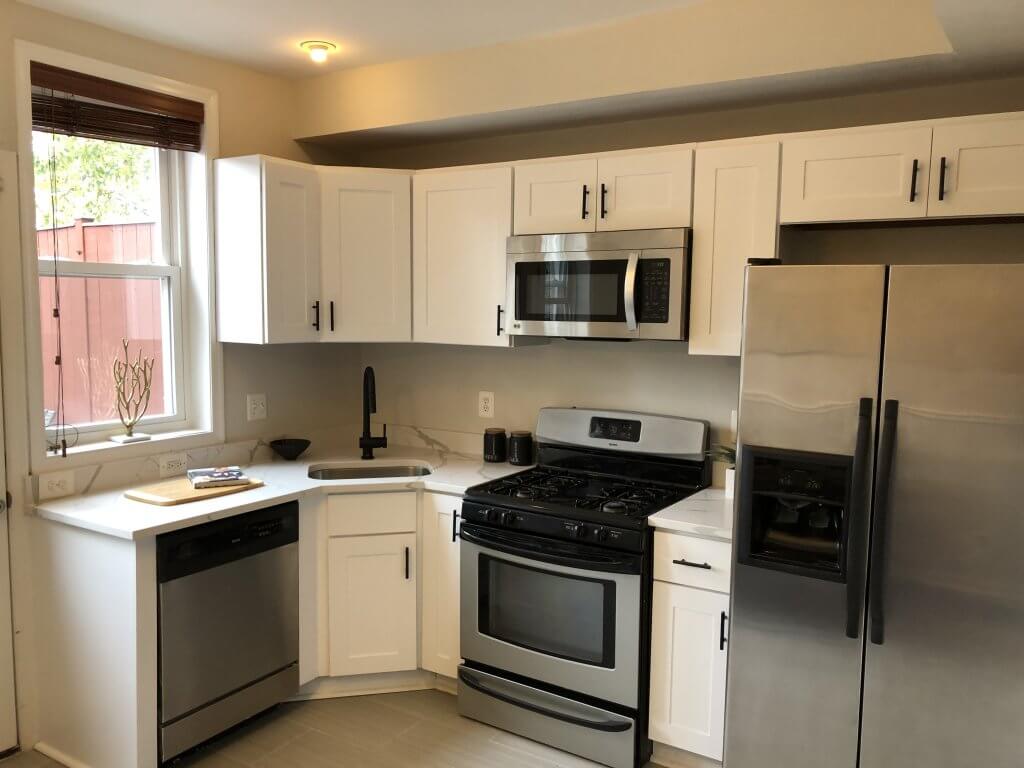 Painting Kitchen cabinets in Towson show the beautiful white cabinets