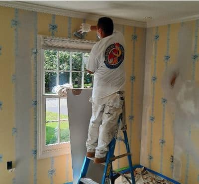 Painting over wallpaper