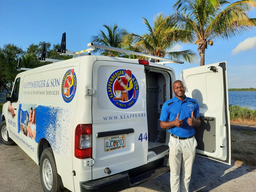 Klappenberger & Son franchisee in Miami standing next to truck