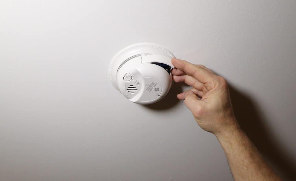 Most Painting contractors will not charge to replace smoke detector batteries so oit won't affect how much it costs to paint a house.