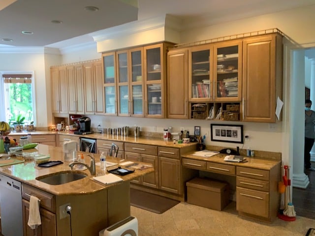 Kitchen cabinet painting contractor before painting cabinet.