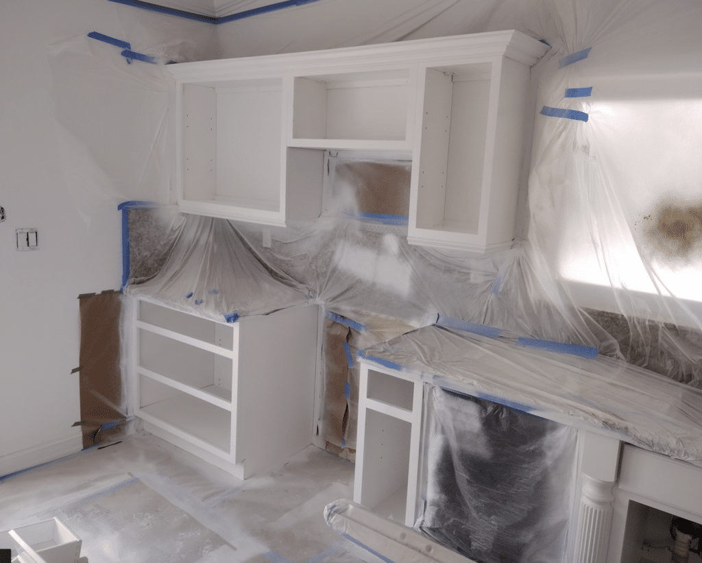 Kitchen cabinet painters in Loudoun spraying kitchen cabinets