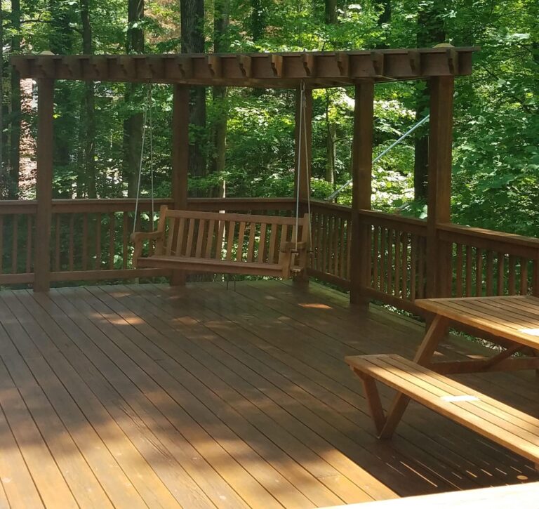 recently sealed deck swing and pergola by painters in Montgomery County