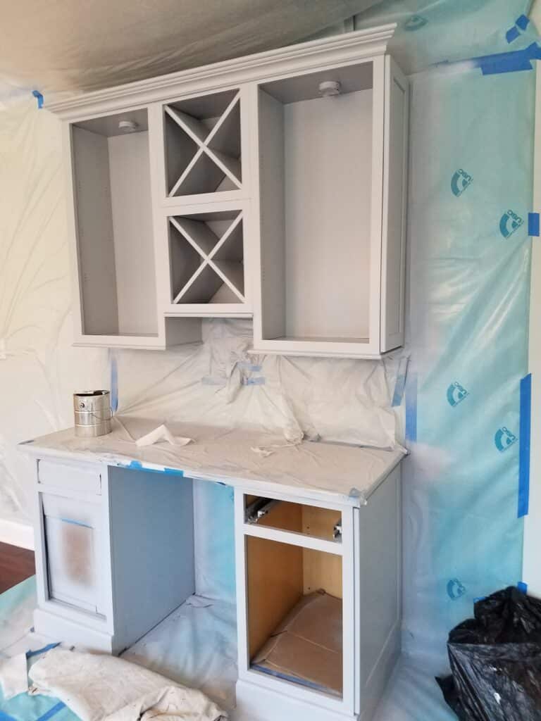 kitchen cabinet painting expert protecting areas from overspray