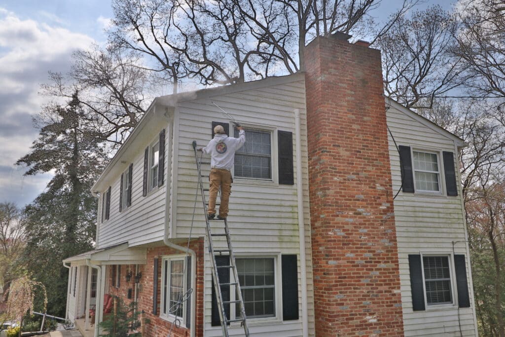 Painting Company In Frederick County power washing house, by Klappenberger & Son