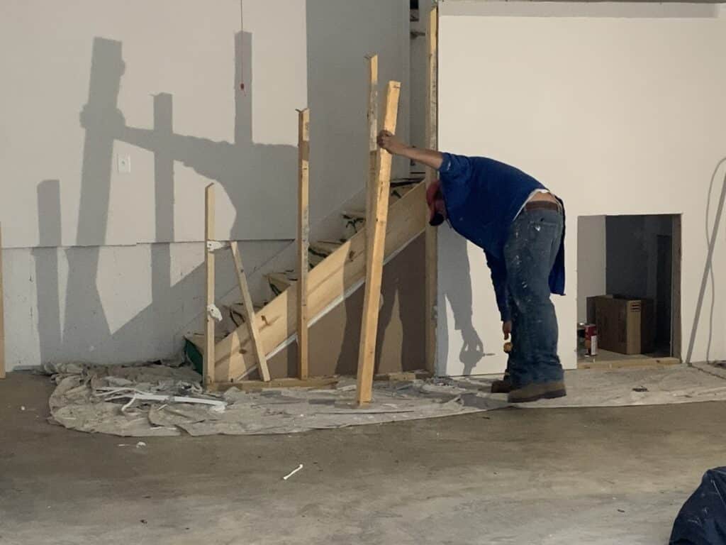 Handyman in Columbus for a day building staircase wall