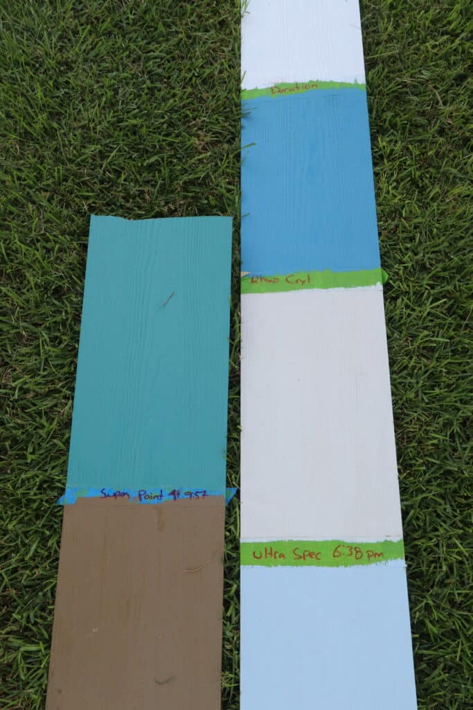 Sample boards of paint were left to dry to see if they are rain-safe.
