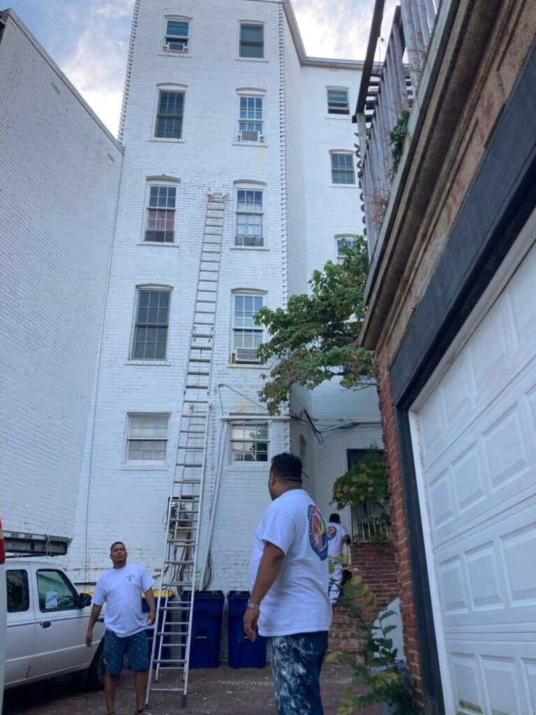 Commercial painting in DC outside building