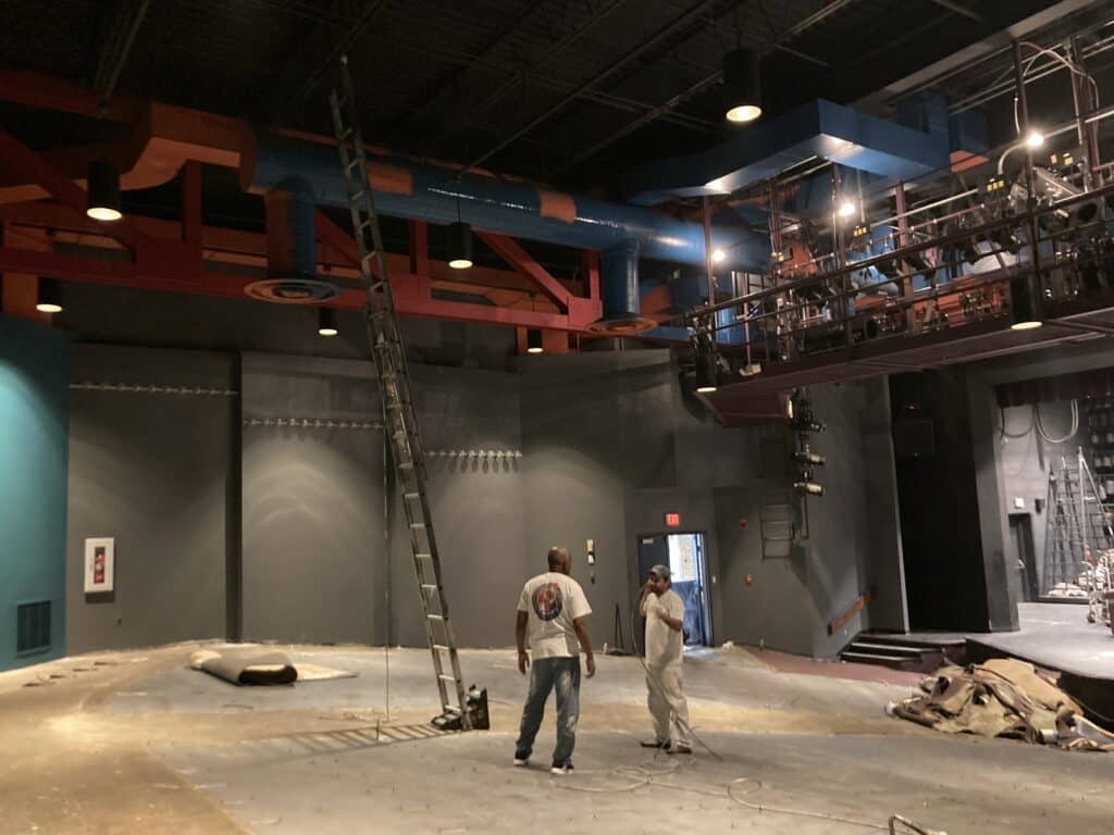 Commercial painting in DC tri corn black on painted walls