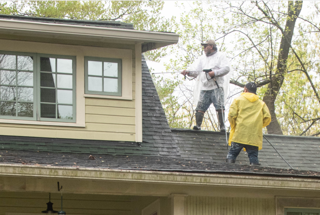 essential home repairs include power washing the house before winter