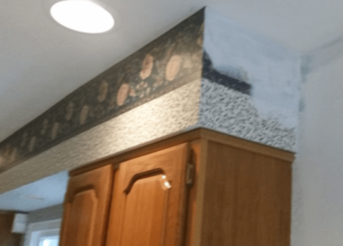 painting over wallpaper in kitchen