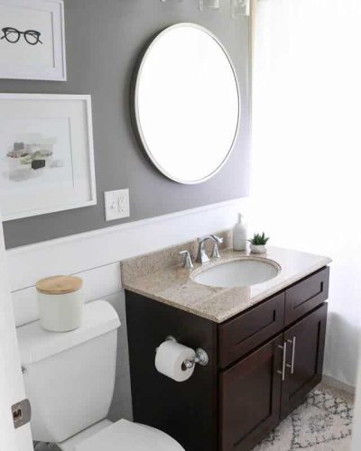 Bathroom remodel services include replacing vanity light and mirror