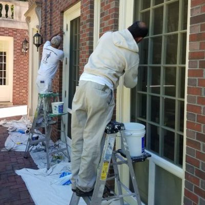 Man Prepping a home to paint in NW DC
