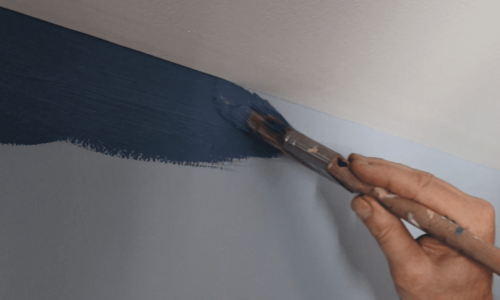 Interior painting in Howard County shows a klappenberger & Son Master Painter painting a very straight line