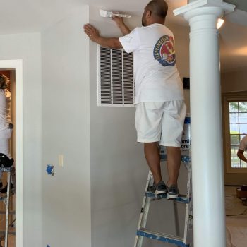 Klappenberger & Son crew painting the interior of a home