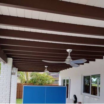 Exterior painting in Sunny Isles includes painting the beam brown and the ceiling white