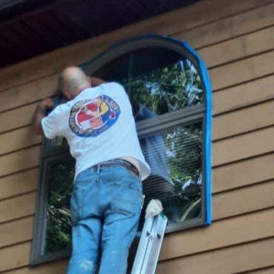 painter taping window prep