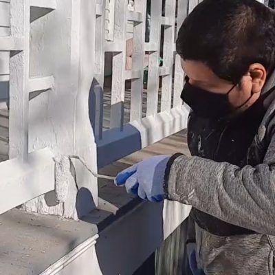 Exterior painting a handrail