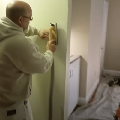 interior painting in DC includes sanding with a vacuum attachment