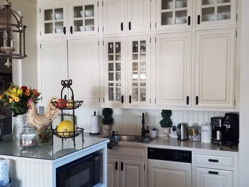 Painting kitchen cabinets in Westminster by Klappenberger & Son Kenny Lee