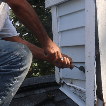 man replacing rotten wood in Ellicott City MD