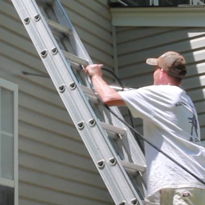 Exterior painting in norman starts with power washing vinyl siding